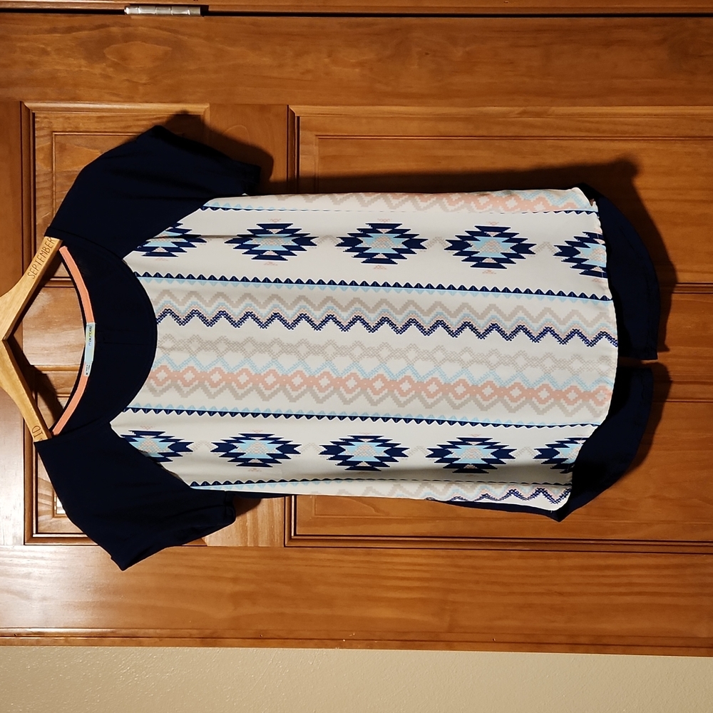 Aztec printed top with a button down open back detail